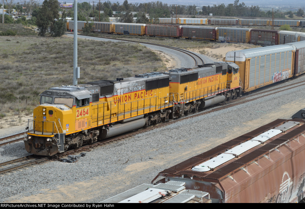 SD60Ms with the Kaiser Hauler